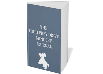 A gray-blue book titled The High Prey Drive Mindset Journal.